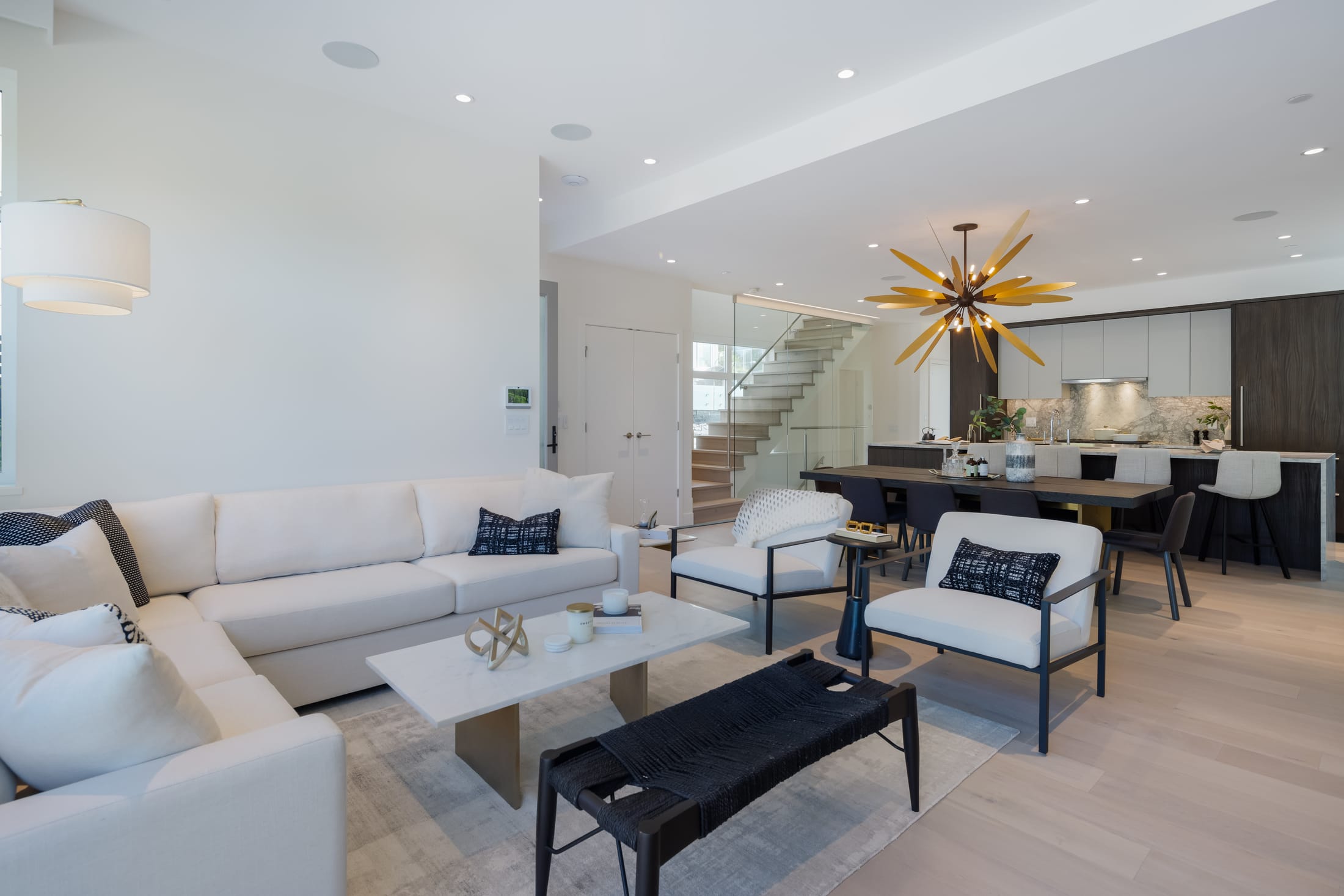 Living and dining with feature lighting at Evelyn
