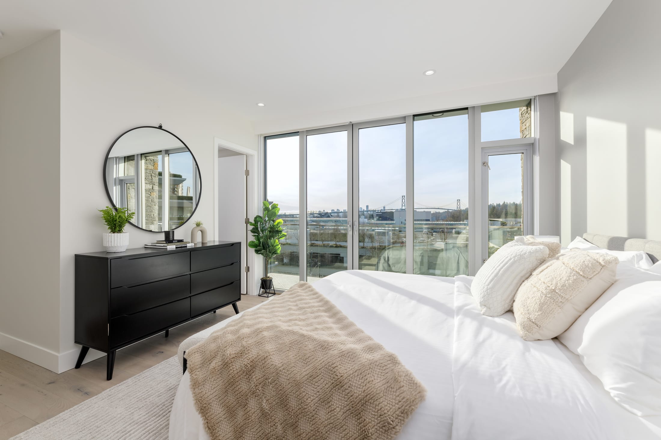Primary bedroom with North Shore views at Evelyn